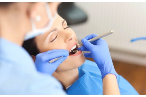 Прием стоматолога парадонтолога