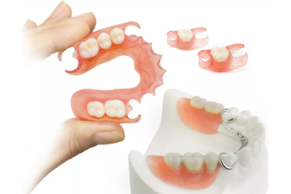 Протезирование зубов пластиночными протезами